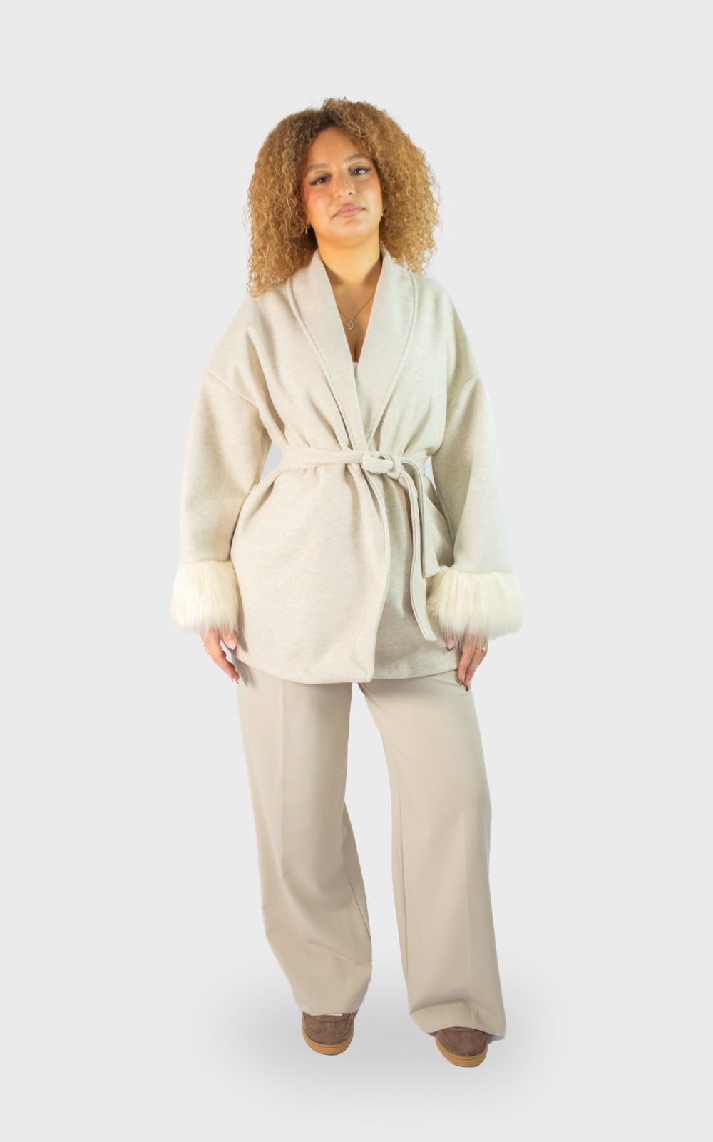 Veste chic ceinturée